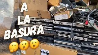 Tarima llena de laptops funcionales para su destruccion