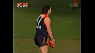 Brett Lovett kicks a goal after taking a contested mark - Melbourne - 1996 Round 19 v Carlton - MCG