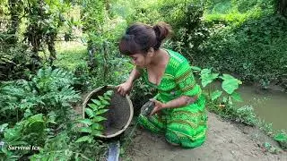 Primitive life - Finding food to survive caught large carp in a hole along the stream