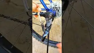 Hands adjust kickstand&mdash;spring guides rhythm of tension, release, and bicycle steadies firm on ground