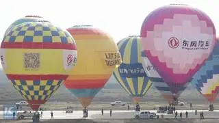 100 couples get married at record hot air balloon wedding ceremony