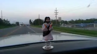 Jesus on the dashboard.