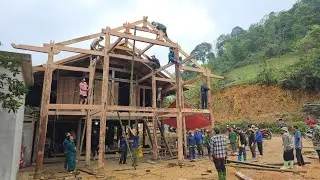 The power of solidarity: Dang& Thanh receive helps from their kind neighbors in building new home.