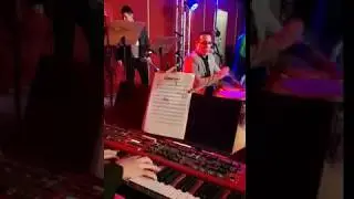 Alex Wilson plays a salsa piano solo over 