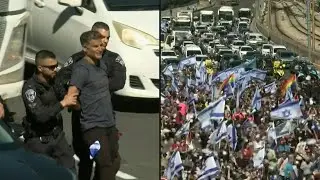 Israel police arrest protester during rally against judicial overhaul | AFP