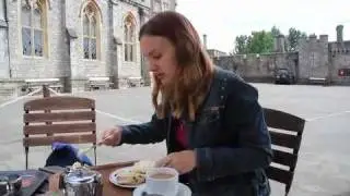 Aliison eating Cream Tea in Exeter