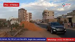 Terrain de 150m² Angle très commercial cité Apix. 47 milion sur une grande route.
