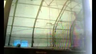 Jessica Taroc flying on a trapeze_12/2010