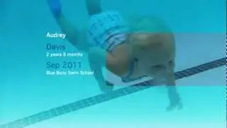 Audrey Davis 3 years old enjoys swimming across and under the water.