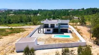 Moradia Isolada T5 nova com 4 Suites, Cave e Piscina inserida num lote de 1309 m2 em Vila Alegre