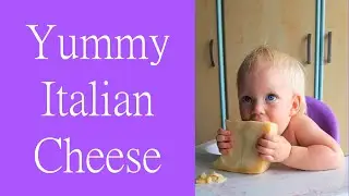 Baby eating Italian cheese