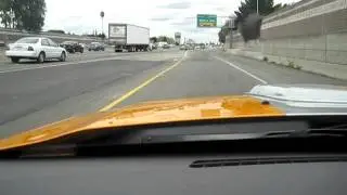 2008 Grabber Orange Shelby Mustang Driving