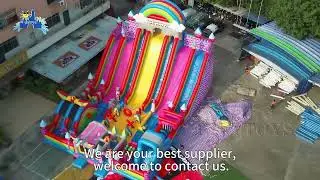 Rainbow-Themed Inflatable Slide Park: Vibrant Fun for the Whole Crowd!