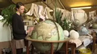 Mastercraftsmen create handmade globes.