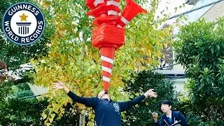 Most traffic cones balanced on the chin - Guinness World Records
