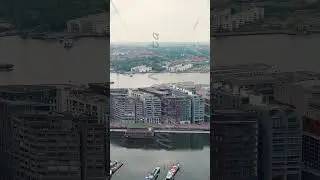 Vertical video. Amsterdam, Netherlands. Nieuwmarkt en Lastage area. Bay IJ (Amsterdam), Aerial Vi...