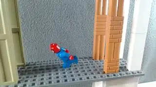 Spiderman falls down a building