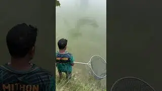 A village fisherman catching fresh fish with a hook from the pond 🐟🔥