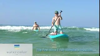 Boy Rides SUP into Shore - WaterColor, FL Resort