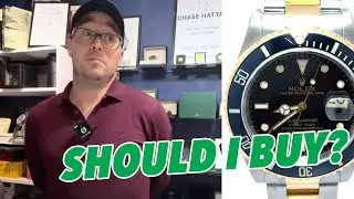 Should I buy a ROLEX GMT II Gold and Black with a scratched bezel?