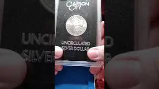 1882 CC Morgan dollar in GSA holder.