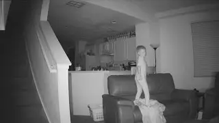 Mischievous 6-Year-Old Boy Caught on Surveillance Jumping on Couches In Middle of Night