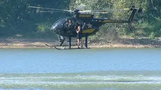 Marine Rescue Team practices jumping from helicopter to save victims