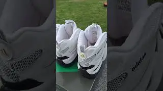 Side to side of Adidas Crazy 8 Kobe White Black 2023 and 2005.