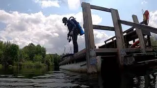 Wyatt doing a Giant stride off the Dock of Crusty's Quarry