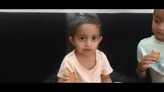 Baby eating ParleG biscuits 