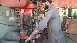 use hand drill machine making hool fast work skills worker in Pakistan