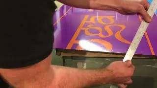 Finishing a vinyl edge on a composite sign panel