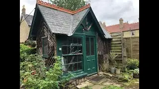Moving an old shed / summer house with scaffold poles and a hand winch - high speed version