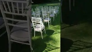 Outside ceremony chair flowers