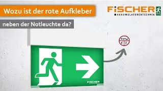 Kennzeichnung von Notleuchten - Wozu ist der rote Aufkleber neben der Rettungszeichenleuchte da?