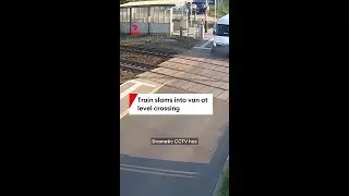 Train slams into van at level crossing