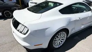 Видеоролик с описанием белого Ford Mustang GT 2016 года с механической коробкой передач. Очень ма...