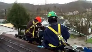 Solar in Coal Country: Lifting final PV module into place