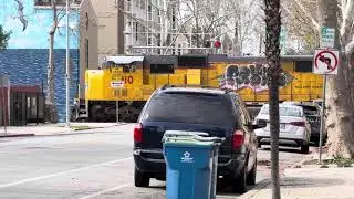 Union Pacific dual locomotive at crossing
