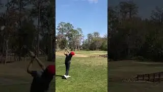 2022 Under Armour National Junior Golf Tournament spin shot over the water hazard for a fifth grader