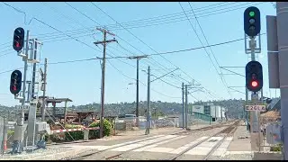 Green & Orange Line Trolleys Keeping Train Signals Busy (El Cajon Transit Center)