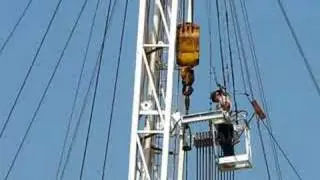 Derrickman Connecting Rods On A Workover Rig 2008