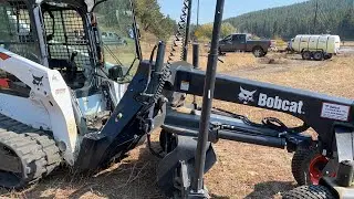 Laser grader on the horse arena