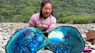 Unexpected Treasure: Rural Child Opens Bizarre Freshwater Clam, Finds Shimmering Pearl Inside