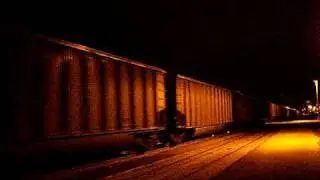 CP 882 BNSF coal train past the Winona, MN depot 2-13-09