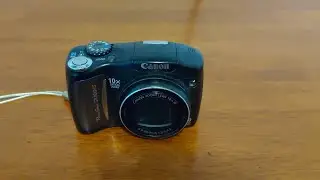 Another Black Canon Digital Camera - Canon PowerShot SX100 IS