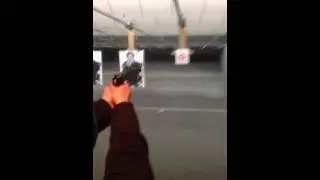 Jenny shooting .22 at Point Blank Range Blue Ash Ohio