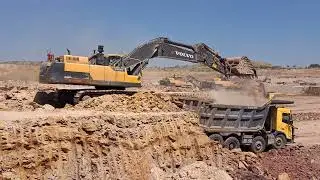 Soil is being loaded from Volvo machine, clay soil which is yellow in colour. EC480Dl Volvo 