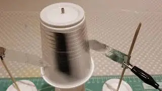 Electrostatic motor with a negative ion generator