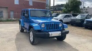 2014 Jeep Wrangler Unlimited Sahara | Hydro Blue Pearl